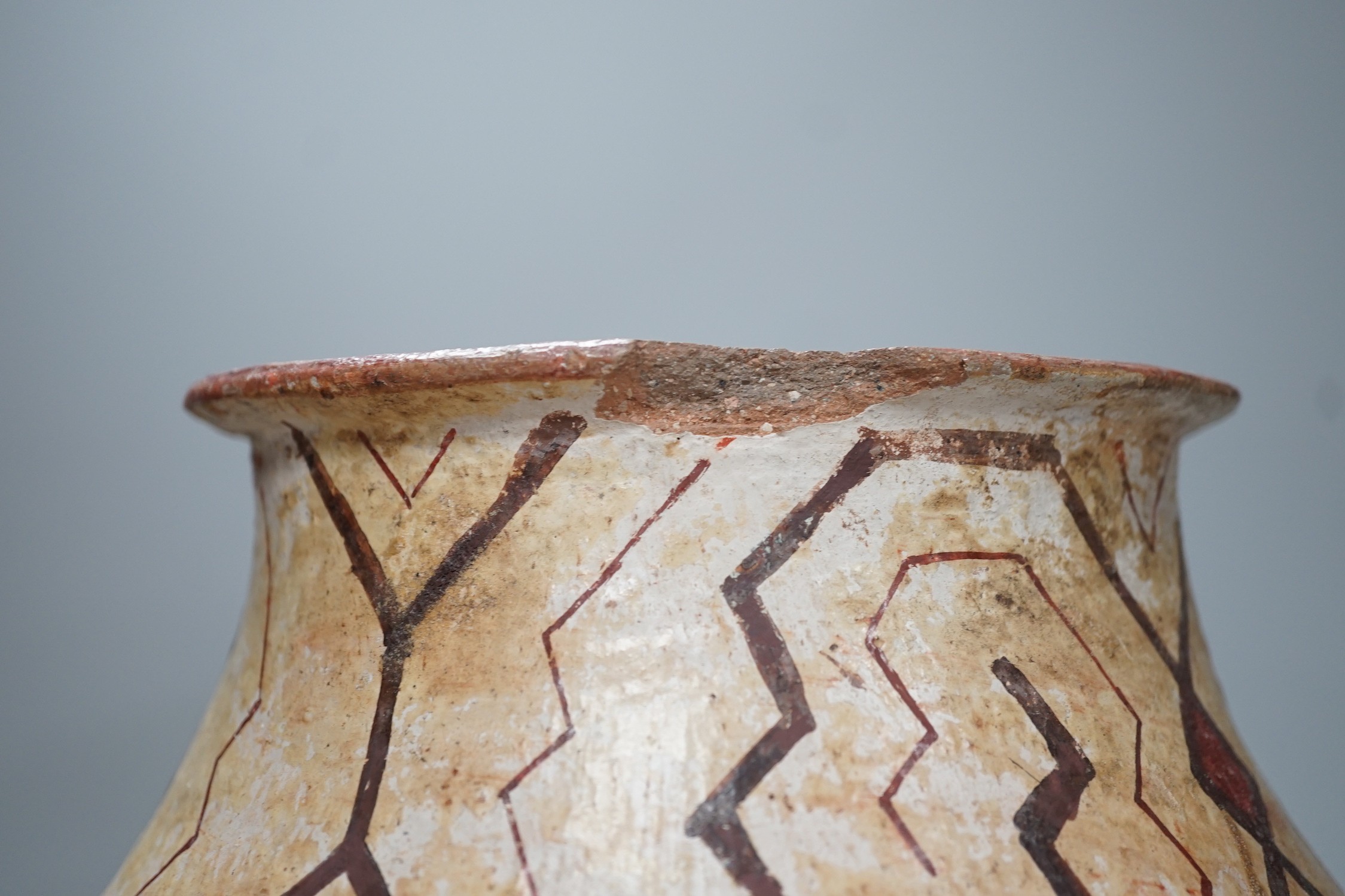 A Shipibo pottery water vessel with geometric pattern, Peru, 26cm tall